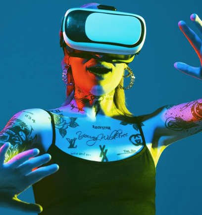A woman wearing VR goggles and trying it out.