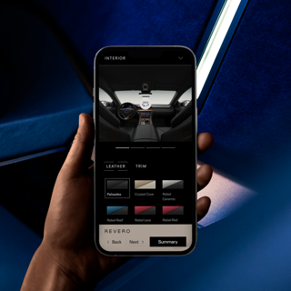KARMA website on mobile with hand